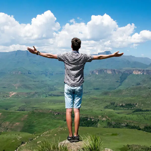 Man stood with arms outstretched